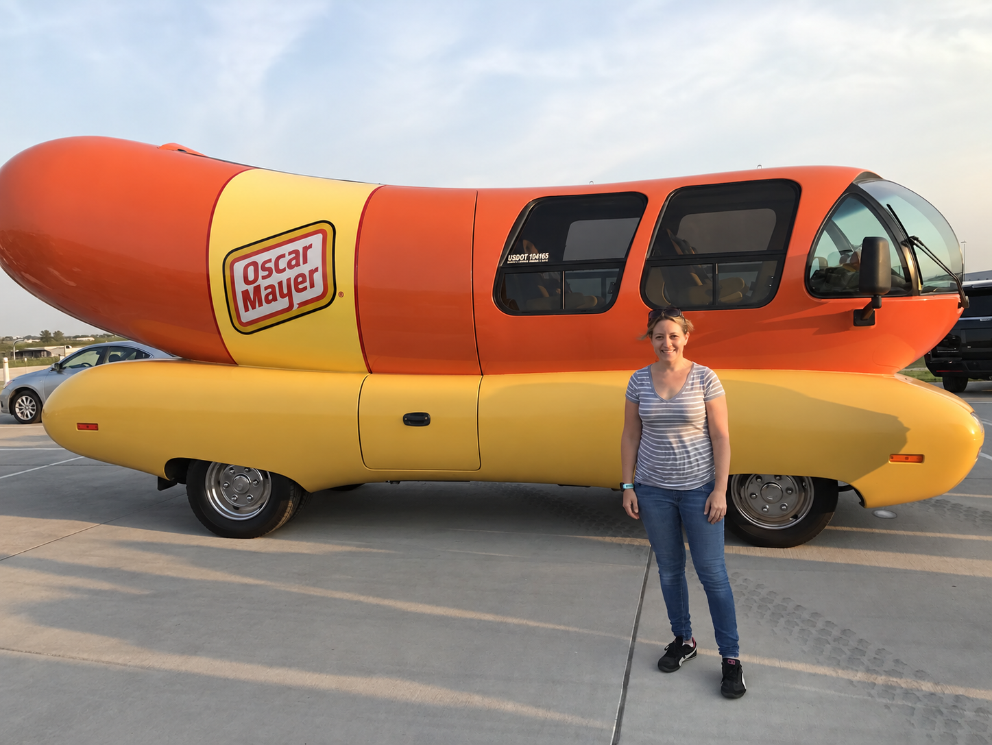 Anat Gotfried beside the Oscar Mayer Wienermobile